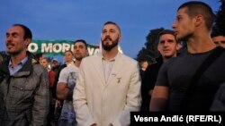 Maksimovic, wearing his trademark white suit, at a September 2016 protest against a controversial development project in Belgrade.