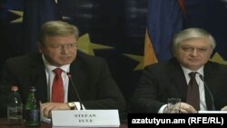 EU Enlargement Commissioner Stephan Fuele (left) and Armenian Foreign Minister Eduard Nalbandian in Yerevan on September 13.