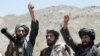 AFGHANISTAN -- Taliban fighters react to a speech by their senior leader in the Shindand district of Herat province, May 27, 2016