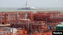 An oil rig and infrastructure of D Island, the main processing hub, at the Kashagan offshore oil field in the Caspian Sea on August 21