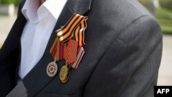 The attackers took money and valuables including military awards and medals belonging to the veteran. (illustrative photo)