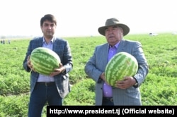 Rustam Emomali (left), chair of the Tajik parliament’s upper chamber and the mayor of Dushanbe, is widely seen as the favored successor to his father, President Emomali Rahmon (right).