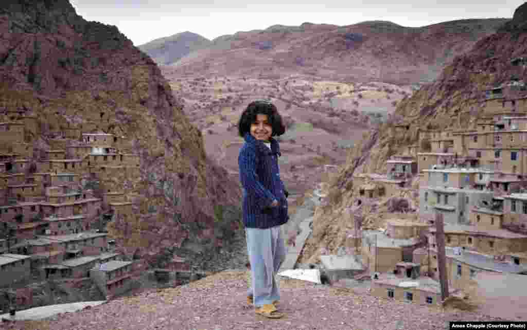 A Kurdish girl in Palangan village. The valley is so steep here that the roofs of many house serve as the yards of the houses above.