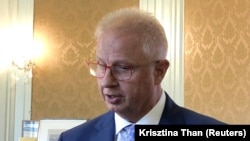 Hungarian Justice Minister Laszlo Trocsanyi speaks to reporters in Budapest in September 2018.