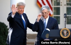 Трамп и Пауэлл в 2017 году.