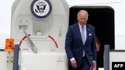 Then-U.S. Vice President Joe Biden leaves Air Force Two upon his arrival in Belgrade on August 16, 2016.