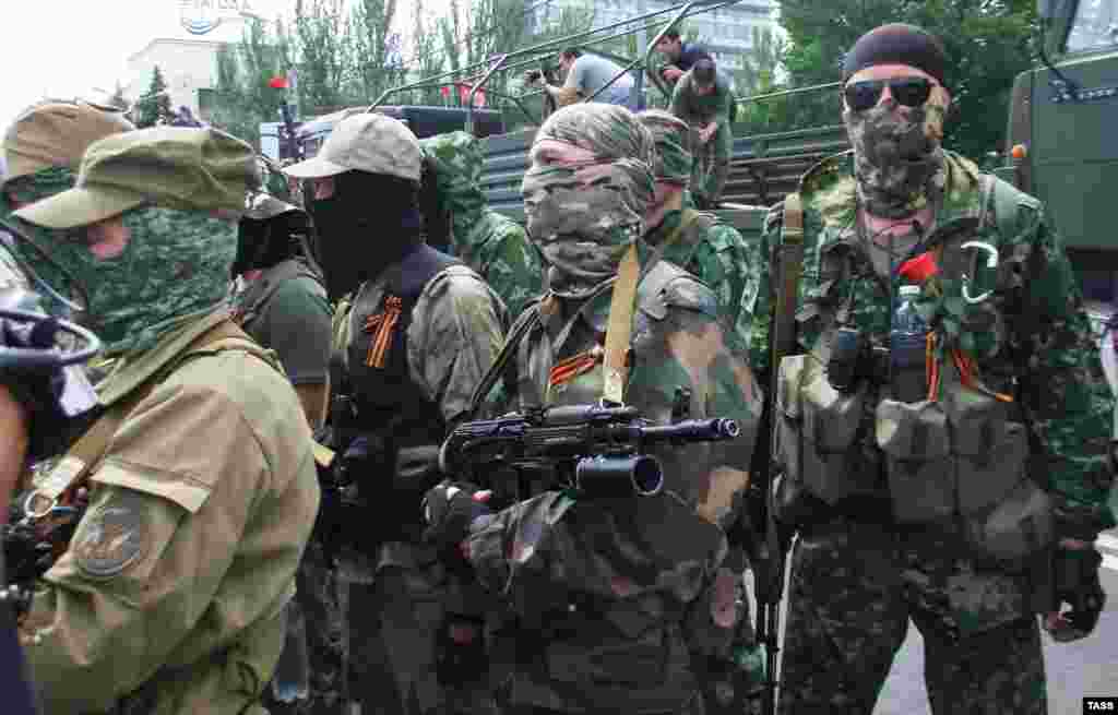 Volunteers recruited from Russia participating in a parade and demonstration in Donetsk on May 25.