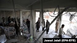 دکان‌های که در اثر یک حمله انتحاری در کابل تخریب شده‌اند. July 25, 2019