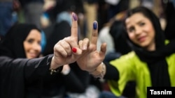 Women casting their votes in the election in Tehran.