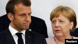 Президент Франції Емманюель Макрон і канцлер Німеччини Ангела Меркель
