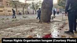 Blood of protesters shot in Marivan, Kurdistan province in Iran seen on the street. Undated