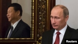Российский и китайский лидеры в 2013 году