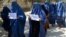FILE: An Afghan women protest