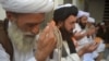 Supporters of Jamiat Nazariyati pray for late Taliban leader Mullah Muhammad Omar in Quetta, Pakistan.