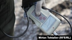 A radiation meter showing radioactive coal at an electricity station in the Kyrgyz capital, Bishkek, on January 25.