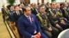 The president's son-in-law, Shamsullo Sohibov, pictured in the blue suit, controls a vast amount of wealth in Tajikistan. 