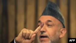 The latest preliminary results show President Hamid Karzai with 54 percent of the vote.