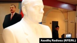 Election officials say just over half of eligible voters in Azerbaijan went to the polls, amid widespread reports of irregularities.