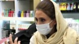 Iran - a woman wears a mask during the coronavirus epidemic - screen grab Reuters