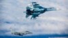 Расейскі зьнішчальнік СУ-27 і брытанскі зьнішчальнік «Тайфун» у міжнароднай паветранай прасторы над Балтыйскім морам 17 чэрвеня 2014 году.