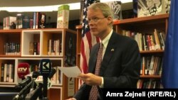 U.S. Ambassador Greg Delawie speaks to reporters in Pristina on January 17.