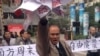 Demonstrators display banners and posters to support journalists from the "Southern Weekly" newspaper near the company's offices in Guangzhou, south Guangdong Province, on January 8.