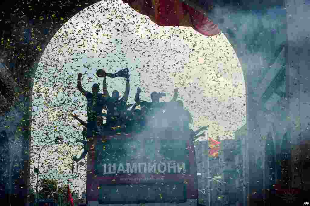 HC Vardar players celebrate winning the European handball title at the main square in Skopje on June 6. (AFP/Robert Atanasovski)