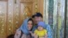 IRAN -- Iranian-British aid worker Nazanin Zaghari-Ratcliffe is seen with her husband Richard Ratcliffe and her daughter Gabriella, undated