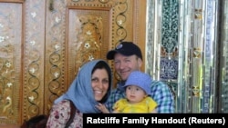 IRAN -- Iranian-British aid worker Nazanin Zaghari-Ratcliffe is seen with her husband Richard Ratcliffe and her daughter Gabriella, undated