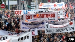 Protesters in Toulouse demonstrate against pension reform on October 16.