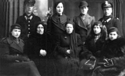 A family picture from Konstanty Bujdo's funeral in 1938 showing Alojze (top left); Wanda (top row, second from left); Jozefa (seated in center); Janina (top row, second from right); and Maria (seated second from right)