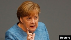German Chancellor Angela Merkel speaks during the 2018 budget debate at the lower house of parliament Bundestag in Berlin on May 16.