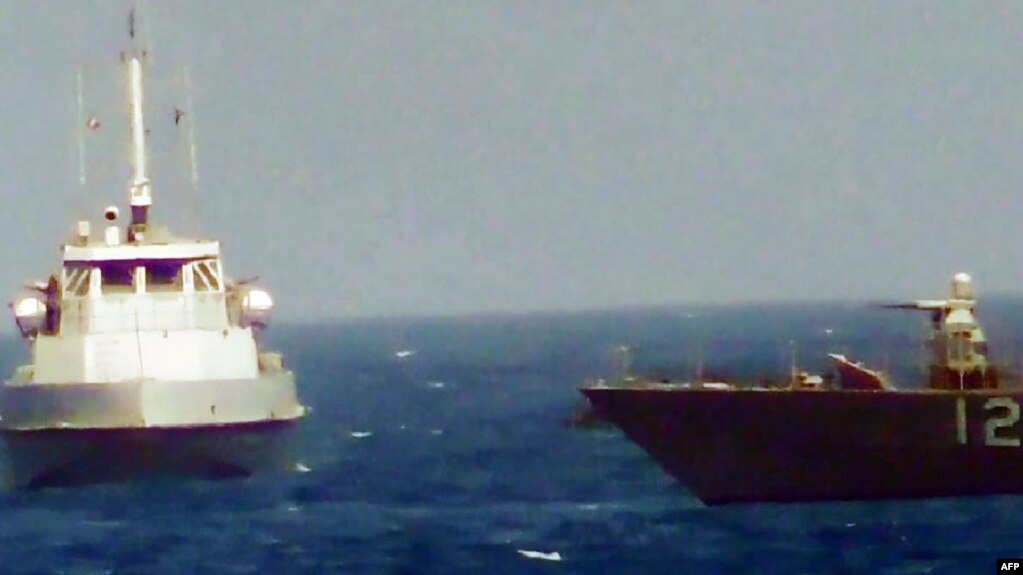 An Iranian boat heads toward a U.S. patrol craft on July 25. Another incident occurred on July 28.