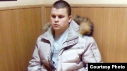 Moscow Police Sergeant Artem Charukhin, who admitted to forging a police report on the arrest of Ilya Yashin