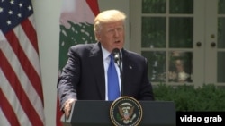 U.S. President Donald Trump speaking during a joint news conference at the White House with visiting Lebanese Prime Minister Saad Hariri on July 25.