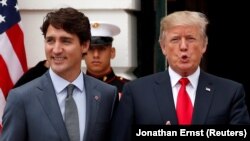 Justin Trudeau și Donald Trump la Washington, octombrie 2017