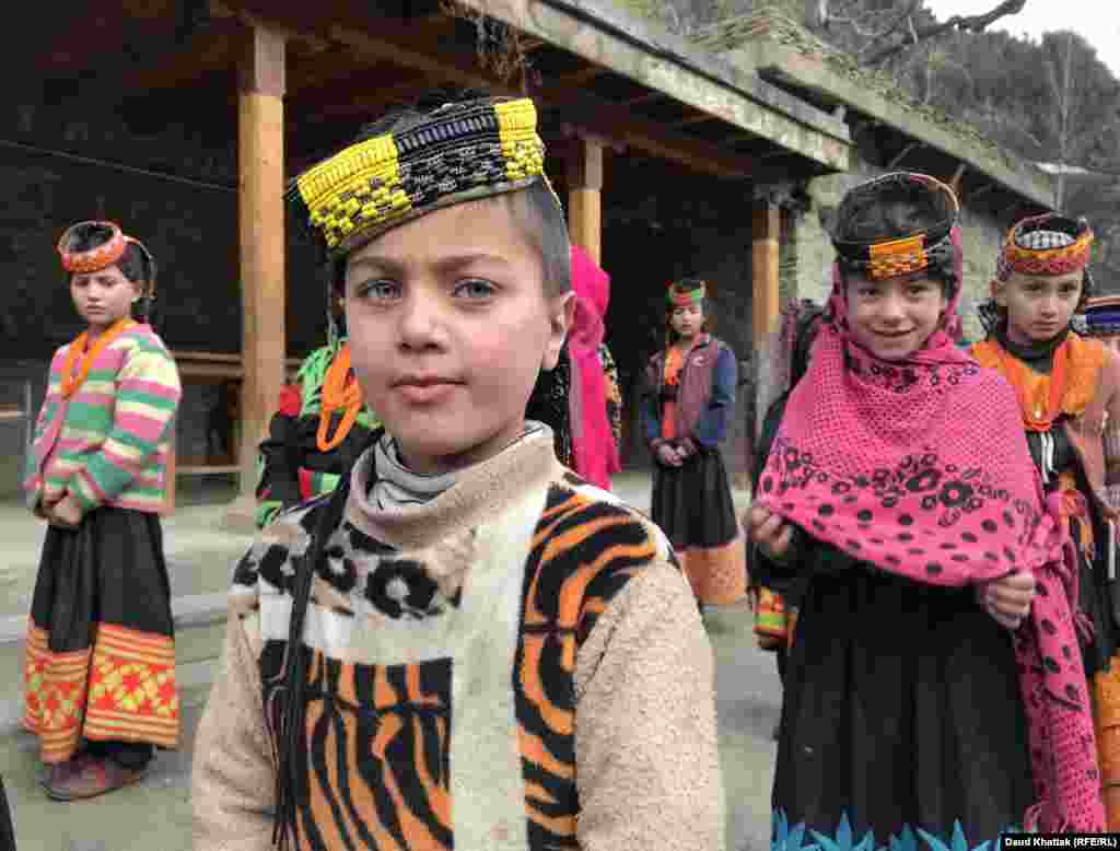 Kalash schoolgirls during morning assembly. Kalash children learn in mixed schools alongside the Muslim children of the surrounding villages. RFE/RL’s Khattak said he watched Kalash children being taught Islamic scripture during lessons. There are currently no separate schools for Kalash children.