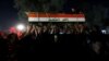 Men carry the coffin of a demonstrator who was killed during antigovernment protests in Baghdad on October 4.