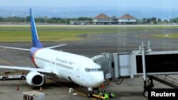 Разбившийся лайнер Sriwijaya Air в аэропорту на острове Бали.
