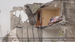 Clear-Up Continues In Albanian Quake Village