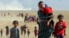 Iraq's Yazidis Tell ICC Of IS 'Genocide'