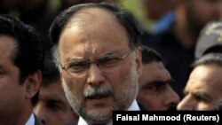 FILE: Pakistan Muslim League Nawaz (PML-N) leader Ahsan Iqbal is accused of corruption in relation to a sports-complex project.