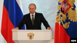 Президент России Владимир Путин выступает с ежегодным посланием. Москва, 4 декабря 2014 года.