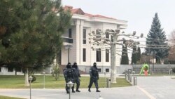 Armenia - Masked policemen are seen outside Ruben Hayrapetian's villa, Yerevan, December 13, 2019.