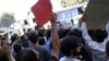 Around 200 demonstrators gathered in front of the parliament demanding the release of labor leader on hunger strike,