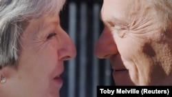 Theresa May i Donald Tusk