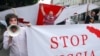 Georgian protestors demonstrate in the streets of Tbilisi