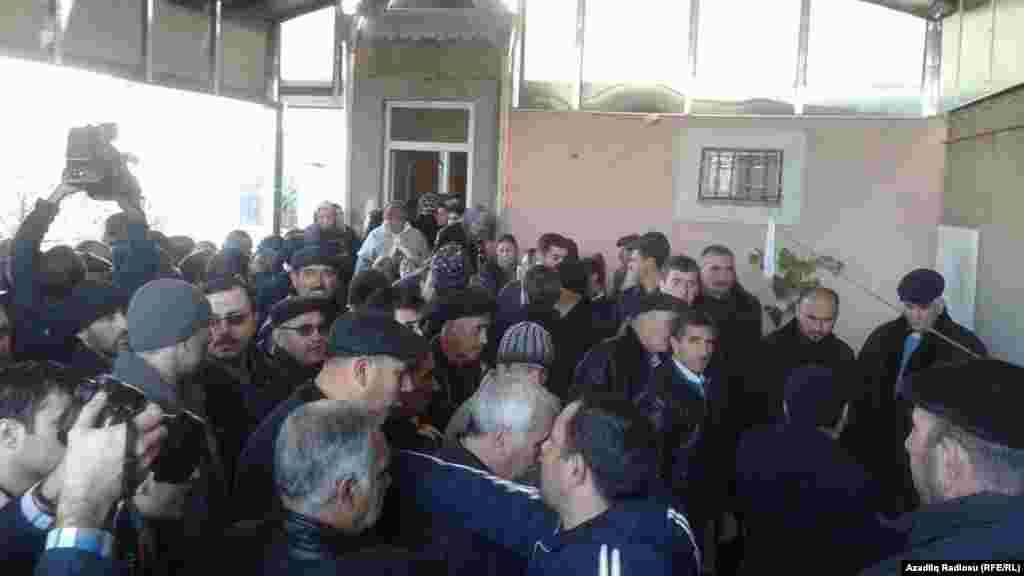 Azerbaijan -- funeral of dead oil workers who died during recent crisis. Baku 8Dec2015