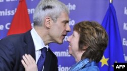 Serbian President Boris Tadic (left) greets EU foreign policy chief Catherine Ashton after giving a press conference in Brussels on February 27.