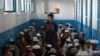 Afghan boys survey  the Koran astatine  a madrasah successful  Kandahar. (file photo)